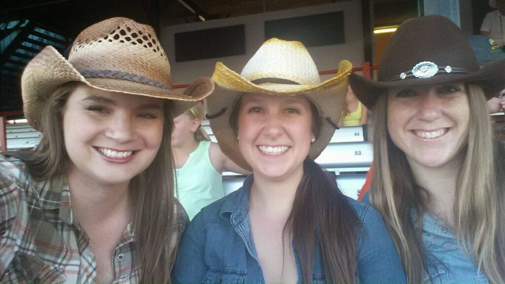 Enjoying the Bull Riding Championships at the Frontier Days rodeo!