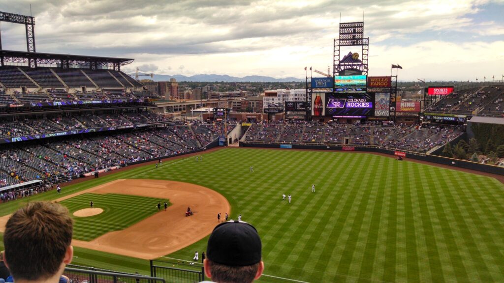 Enjoying a Colorado Rockies game - even though Ashley is a die-hard Angels fan!