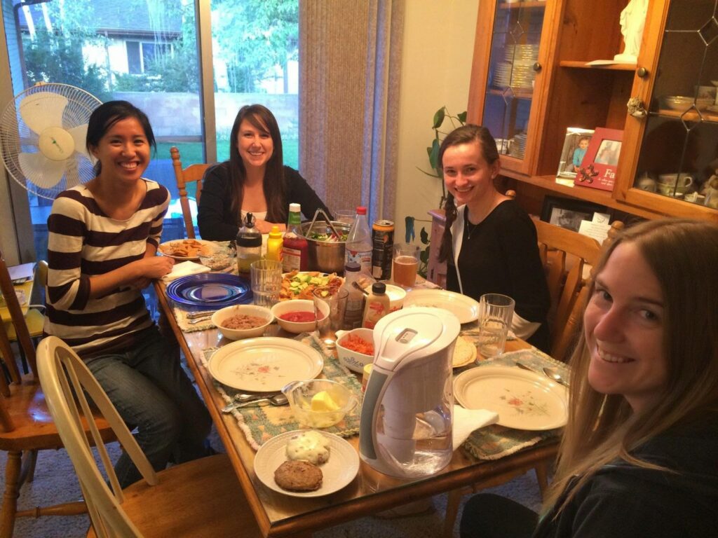 The optometry family enjoying a potluck dinner after a long day in clinic.