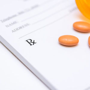 pills on a prescription pad